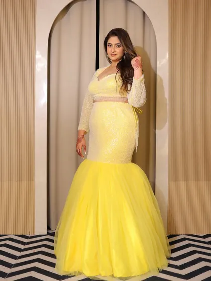 The full look of the yellow fish-cut lehenga. I design my plus-size outfits to be both stylish and comfortable, so you can dance the night away.