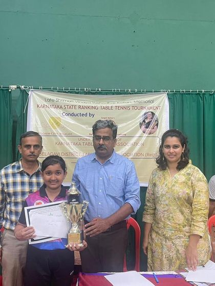 A player from our academy receives her trophy and certificate at the Belgaum state ranking tournament. We celebrate the success of all our paddlers who achieved top positions in various age categories.