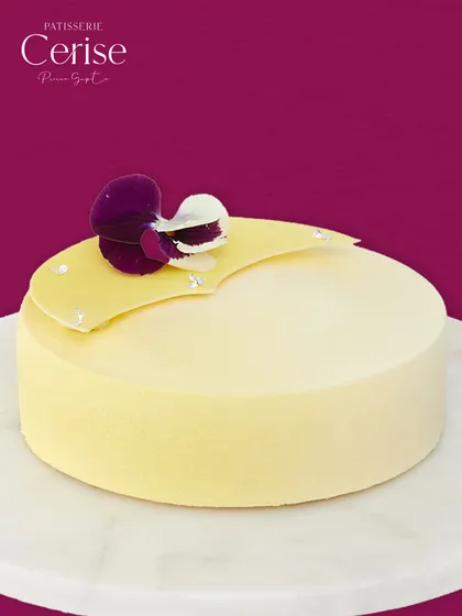 L’Exotique, a vibrant symphony of tropical flavours. This entremet captures the essence of pineapple, passion fruit, and mango in every bite.