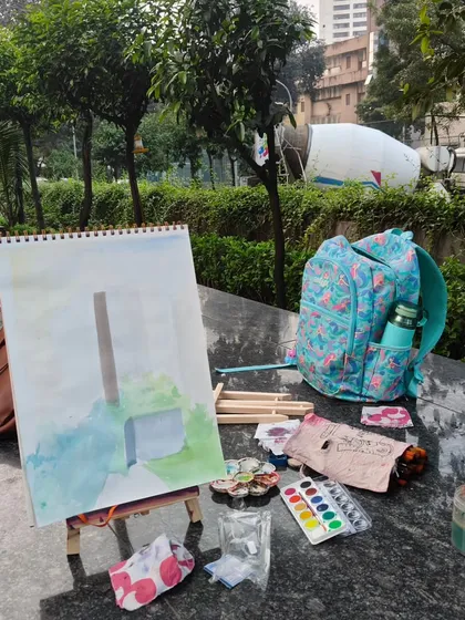 The artist's setup during our outdoor class. With a portable easel and watercolors, you can create a masterpiece anywhere.