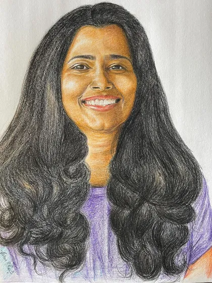 A commissioned color pencil portrait on A3 paper. I focused on capturing her bright smile and the soft waves of her hair, using careful layering to create depth and realism. These individual portraits make for very personal and heartfelt gifts.