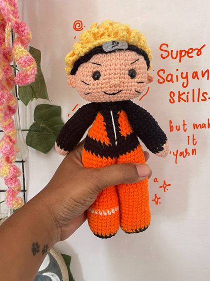 "Super Saiyan skills, but make it yarn." Another fun shot of the custom Naruto plushie, highlighting the handcrafted details.