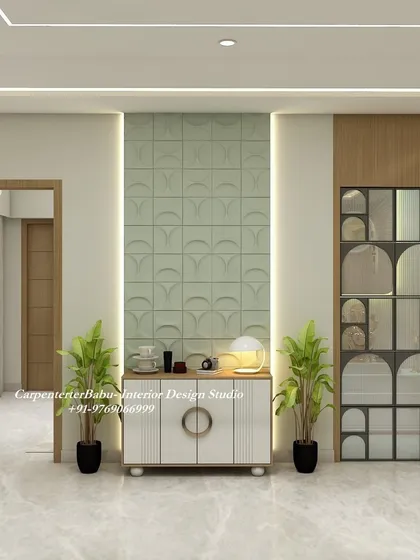 This console area serves as a beautiful entryway feature. The combination of a 3D textured wall, a sleek white console, and a modern arched display cabinet creates a stunning first impression.