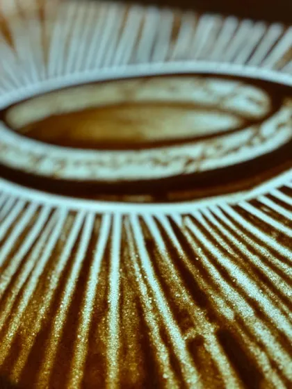 An abstract, powerful image from 'The Rings of Power' project. This piece represents the intricate and mystical elements of the story, showcasing a more symbolic style of sand art.