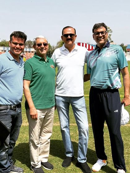 With friends and colleagues from the SCBA at the cricket tournament. The company of friends makes the game even more enjoyable.