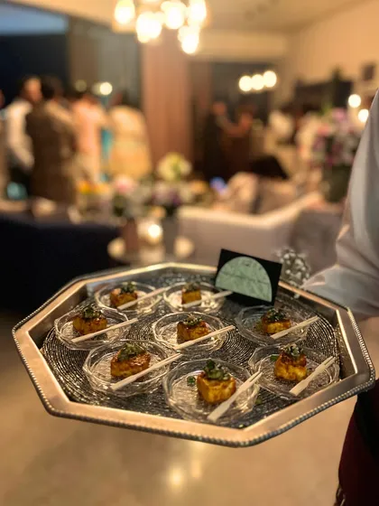 Our service is seamless and designed to let you be a guest at your own party. Our professional staff ensures every detail is handled, from passing beautifully plated appetizers to managing the entire culinary experience from start to finish.