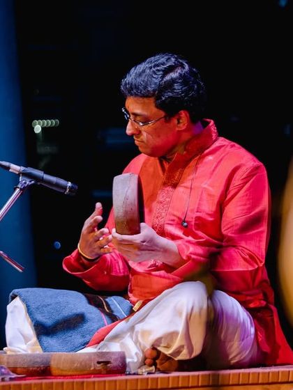 G Guruprasanna playing the khanjira at my 'Abhivandanam' concert. This small but powerful percussion instrument adds a unique texture and complexity to our sound.