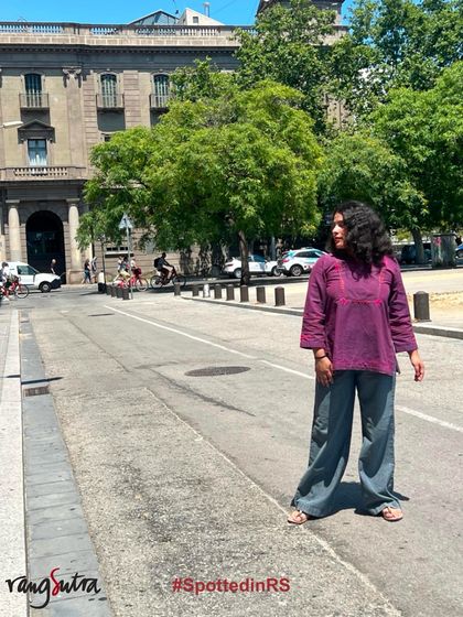 A customer spotted in our Haveli Soof Top, paired with wide-leg pants. We love seeing how you make our clothes part of your journeys and your personal style.