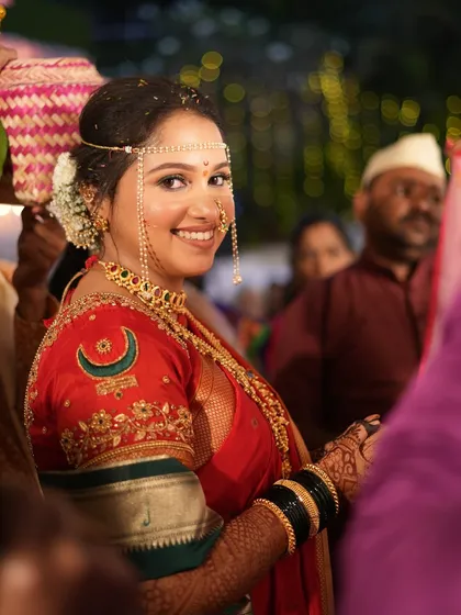 A candid shot of the bride looking back with a happy smile.