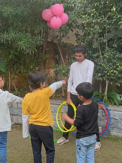 I love creating fun-filled events for the community. At our launch party, kids enjoyed a variety of games, including hula hoop challenges, which brought smiles to everyone's faces.