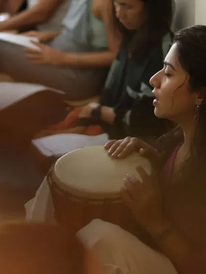 Capturing the essence of devotion, the Bhakti Bhav. Chanting and kirtan are powerful practices that connect us to our hearts. Here, in a moment of shared musical meditation, we experience the joy and unity that comes from raising our voices together.