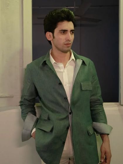 Conquer the season in style with our deep green safari jacket, a perfect blend of luxury and practicality.