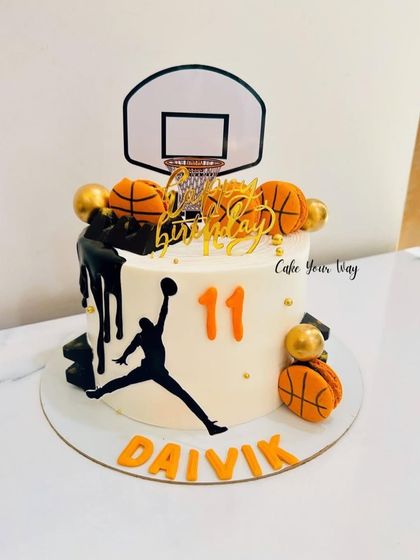Dribbling into a sweet 11th birthday with this awesome basketball-themed cake.