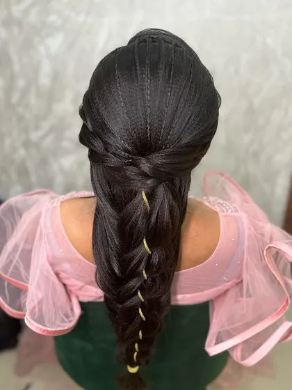 The full view of this complex and beautiful mermaid braid, showcasing the skill and artistry involved in creating advanced hairstyles.