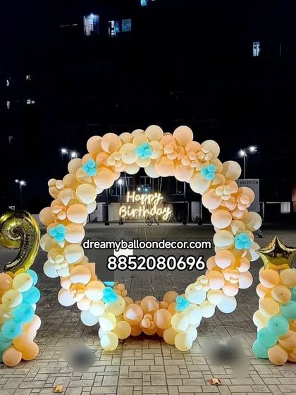 A birthday celebration set up in an outdoor parking area. This shows that I can create a beautiful and complete party backdrop anywhere you need it.