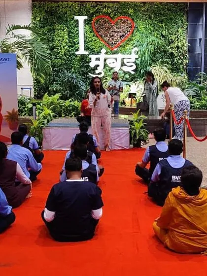 An instructor addressing the airport staff, explaining the benefits of the practice. Education is a key component of my programs, ensuring participants understand the 'why' behind the 'what'.