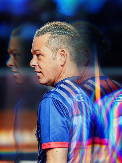 A creative portrait of a player, using a prism effect to add an artistic flair. This style of sports portraiture focuses on the athlete's personality and intensity.