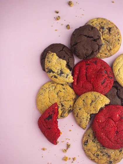 A colorful assortment of my most popular cookies, including classic chocolate chip, red velvet, and double chocolate. Perfect for a gift box or a party platter.