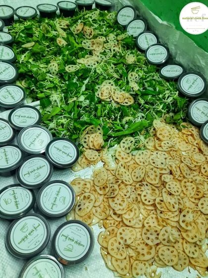 Prepping the fresh ingredients for our top-selling Manipuri Singju, including lotus root and fresh greens.