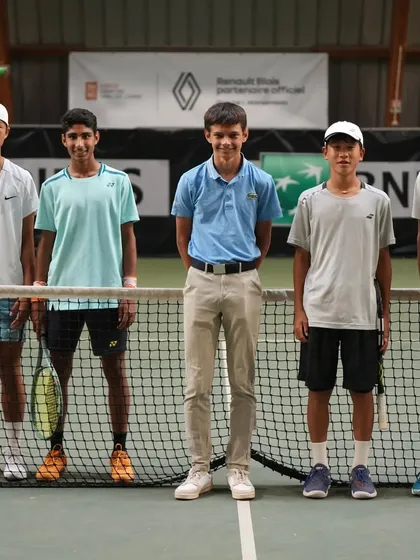 The doubles finalists line up at the Tournoi Loire Vallée event in France, with my player Tavish Pahwa ready for the match. International exposure is key to my training philosophy.