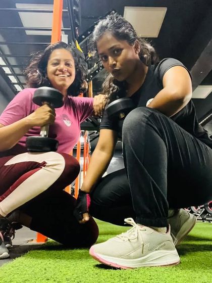 Posing with a friend after a great workout session. The gym is one of my happy places, where I recharge my energy to bring my best self to your event.