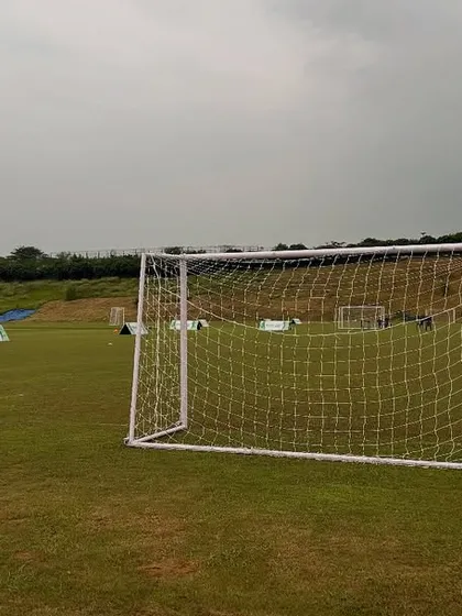 The full-size goal and well-maintained pitch at one of our training grounds for the Reliance Foundation Junior League.
