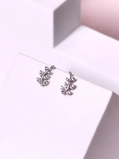 Another look at our beautiful leaf-inspired studs, crafted to bring a touch of nature's grace to your style.