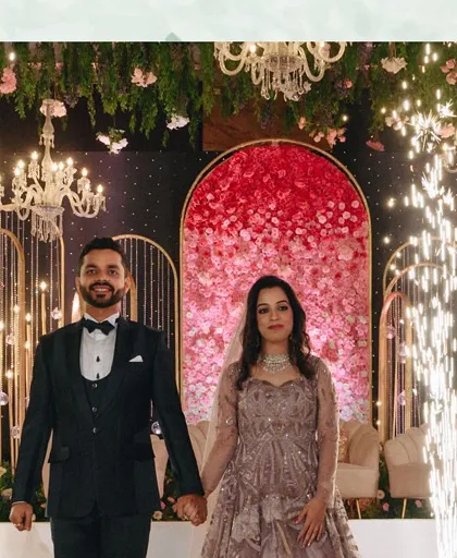 A magical reception entry with cold pyros and a stunning floral backdrop. We create these grand moments to make the couple feel like stars of their own movie.