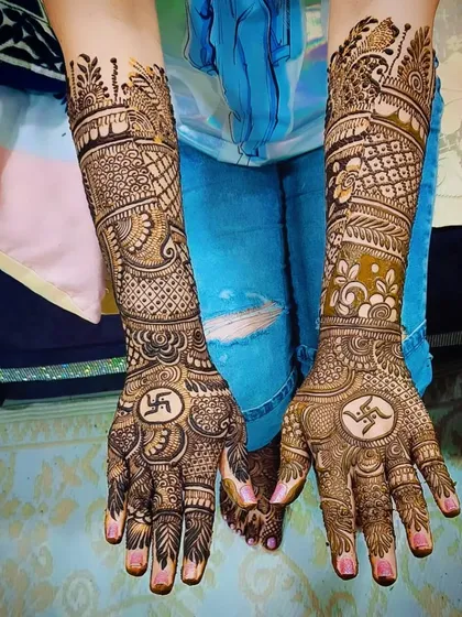 Another clear shot of the full-arm swastika design, showcasing the detailed work on the forearms.