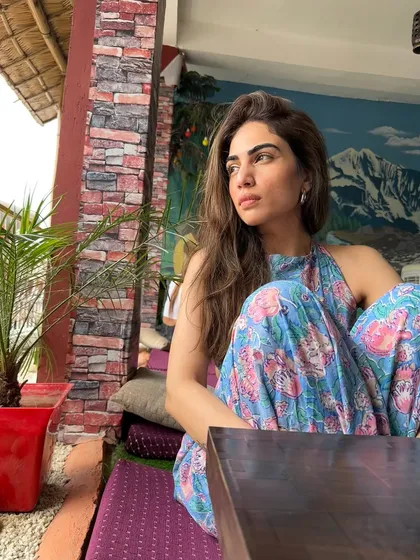 Taking a break at a cafe in Rishikesh. The relaxed fit of this jumpsuit makes it ideal for a long day of walking and sightseeing.