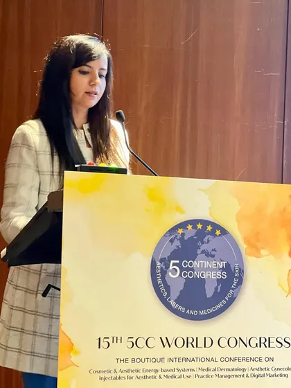 At the podium during the 5CC World Congress in Lisbon. My talks often focus on my favorite topic, Vitiligo, sharing insights on both its medical and surgical management.