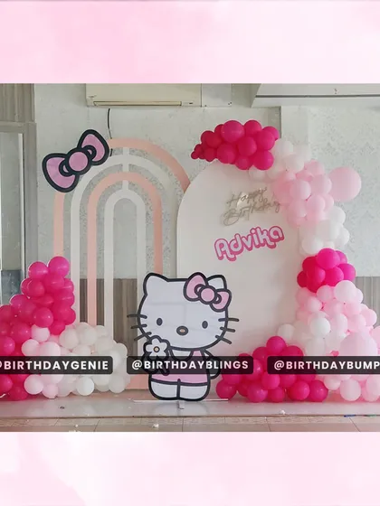 A sweet and simple Hello Kitty theme. The pink and white color scheme, character cutout, and rainbow-arch backdrops create a clean and adorable look.