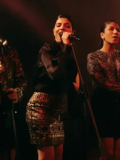 A closer shot of the singers, highlighting their expressive performance. The styling was kept elegant and uniform to support their role within the larger narrative of the jazz club.