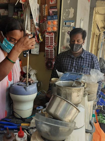 Another shot from our bustling Mumbai workshop, where a participant is fixing a mixer. These events are all about community-driven, hands-on learning.