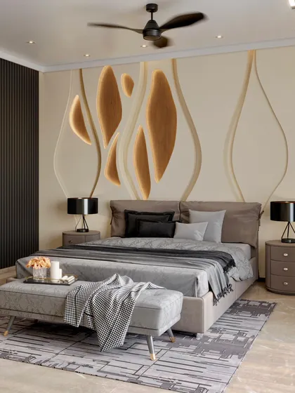 A view of the headboard wall in the same bedroom, continuing the theme of gentle curves. The custom wall panel features backlit, veneer-inlaid organic shapes, creating a soft and artistic focal point.