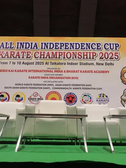 The stage setup for the 19th All India Independence Cup, showcasing the event's branding and the logos of our supporting organizations.