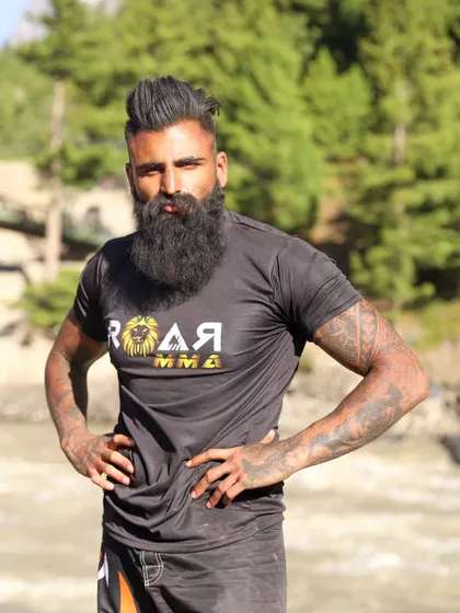I am your coach, not your friend. I will push you, break you, and then rebuild you into a fighter. My methods are intense because the real world doesn't play fair.