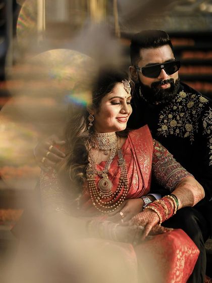 An artistic shot using a prism effect to frame this beautifully dressed couple during their pre-wedding session.