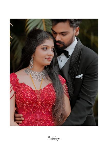 A classic, elegant reception portrait. The couple's pose exudes sophistication and love, a perfect memory of their grand celebration.