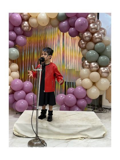 A rockstar superhero, this performer brings a unique style and attitude to the stage.