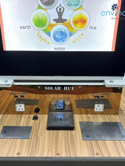 Here is a close-up of the user-centric design of our solar hub. It features multiple charging options including fast-charging USB sockets, standard laptop power outlets, and a convenient wireless charging pad, ensuring every device can be powered up.