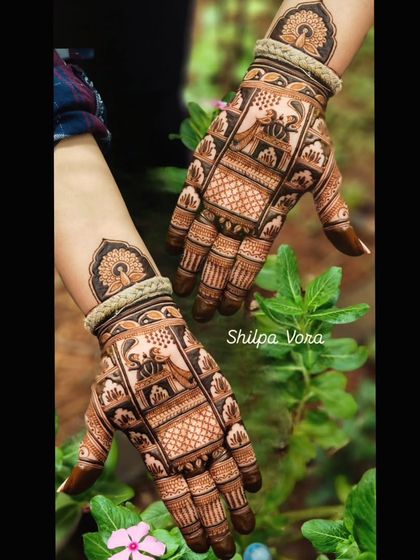 A design featuring a doli scene, perfect for a bride. The intricate details capture the essence of the wedding ceremony.