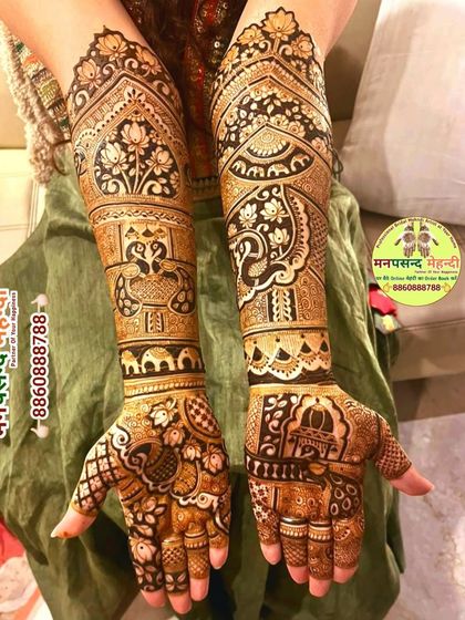 This design showcases a beautiful blend of peacocks, elephants, and lotus motifs. The intricate patterns and clean lines demonstrate my expertise in traditional henna art.