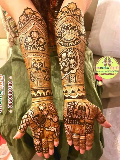 This design showcases a beautiful blend of peacocks, elephants, and lotus motifs. The intricate patterns and clean lines demonstrate my expertise in traditional henna art.