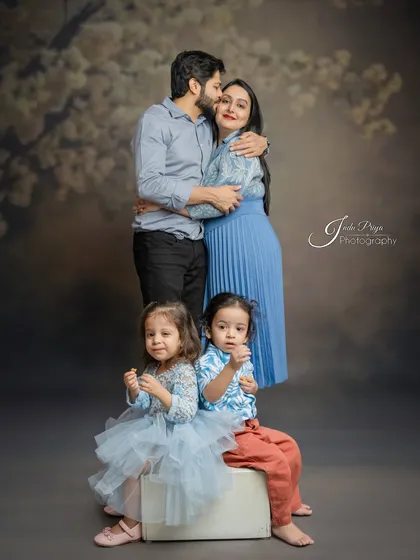 A family portrait is more than just a photo; it's a memory of love and connection. I focus on capturing those unscripted, warm interactions that truly define your family's bond in my comfortable studio setting.