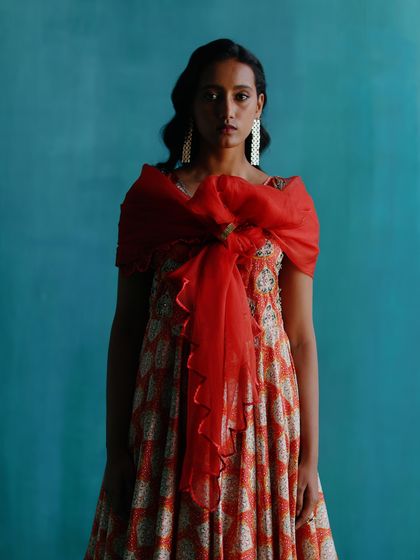 A creative way of styling the dupatta, tied in a large bow at the front. This shows my ability to think outside the box and add a modern twist to traditional wear.