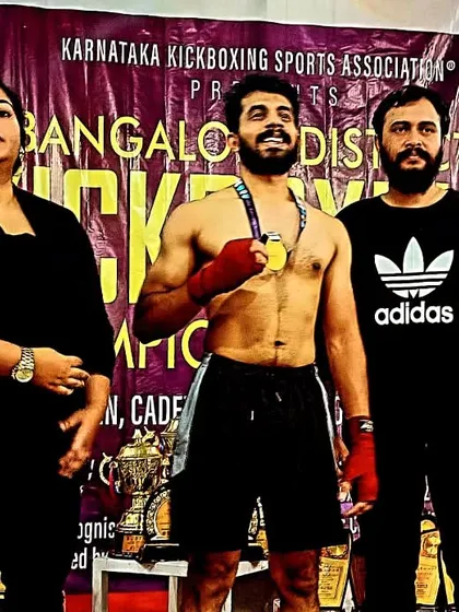 We are proud of our competition team. Here is one of our students after winning the gold medal at the Bangalore District K1 Kickboxing championship.