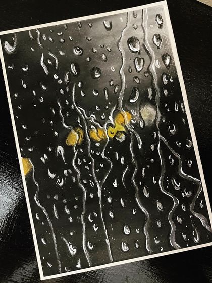 My take on a rainy monsoon day, using oil pastels to create the effect of water droplets on a window. It was a fun challenge to create a sense of depth and transparency.