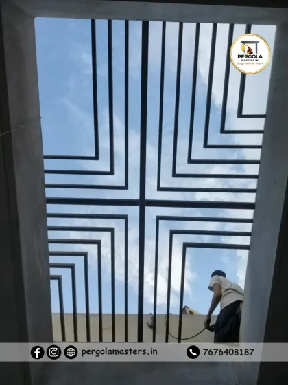 A simple yet bold geometric skylight design, shown here during installation. The strong lines of the metal frame create a modern look, allowing an unobstructed view of the sky and flooding the space below with light.