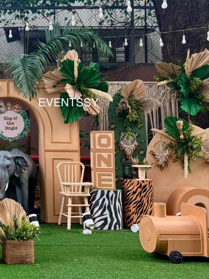 A view of the setup featuring large 'ONE' blocks and an elephant prop, perfect for a first birthday photo opportunity.